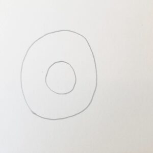 Step one of drawing a sunflower for Bible journaling – two pencil-drawn circles, one inside the other, forming the flower center and petal guide